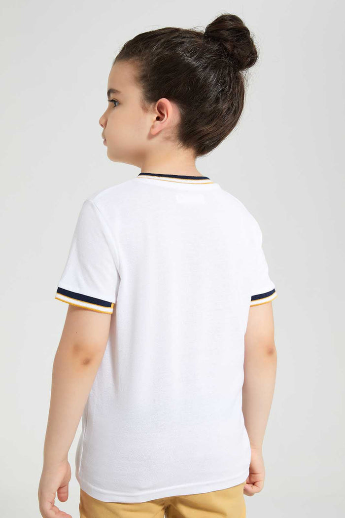 Redtag-White-Pique-Collar-Stand-Polo-BOY-Polo-T-Shirts,-Category:Polo-T-Shirts,-Colour:White,-Deals:New-In,-Filter:Boys-(2-to-8-Yrs),-New-In-BOY,-Non-Sale,-S22D,-Section:Boys-(0-to-14Yrs)-Boys-2 to 8 Years