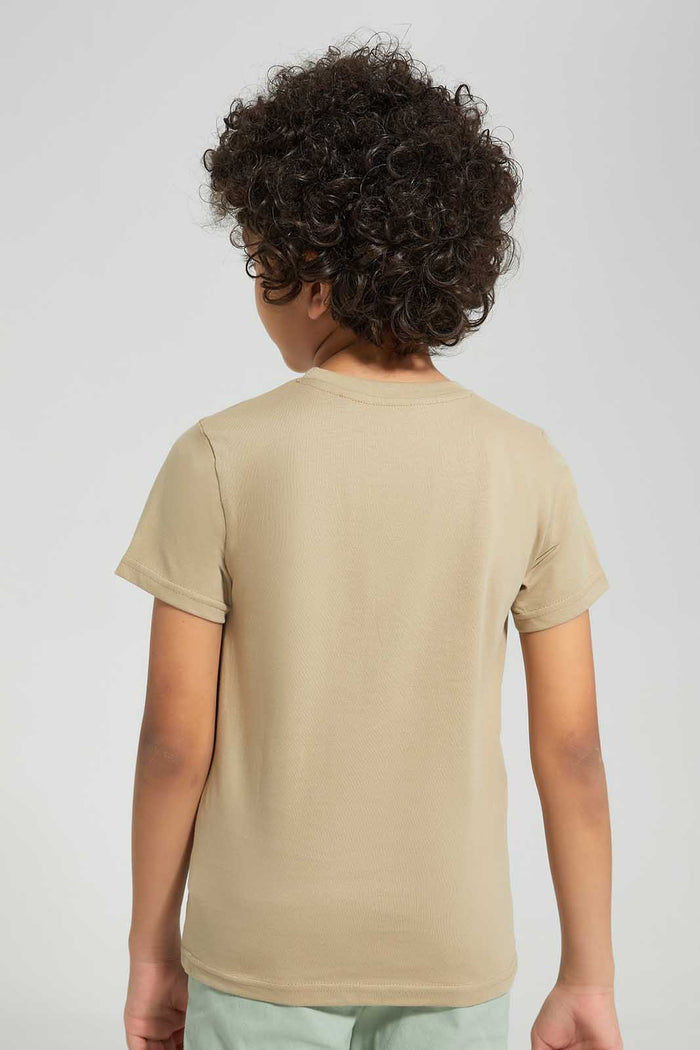 Redtag-Stone-Dino-Print-Pocket-SS-T-Shirt-BOY-T-Shirts,-Category:T-Shirts,-Colour:Beige,-Deals:New-In,-Filter:Boys-(2-to-8-Yrs),-New-In-BOY,-Non-Sale,-Section:Boys-(0-to-14Yrs),-TBL,-W22O-Boys-2 to 8 Years