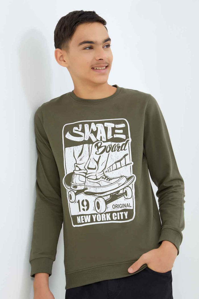 Redtag-Boys-Olive-Skate-Board-Graphic-Sweat-Tee-BSR-Sweatshirts,-Category:Sweatshirts,-Colour:Green,-Deals:New-In,-Dept:Boys,-Filter:Senior-Boys-(8-to-14-Yrs),-New-In-BSR-APL,-Non-Sale,-S23A,-Section:Boys-(0-to-14Yrs),-TBL-Senior-Boys-9 to 14 Years