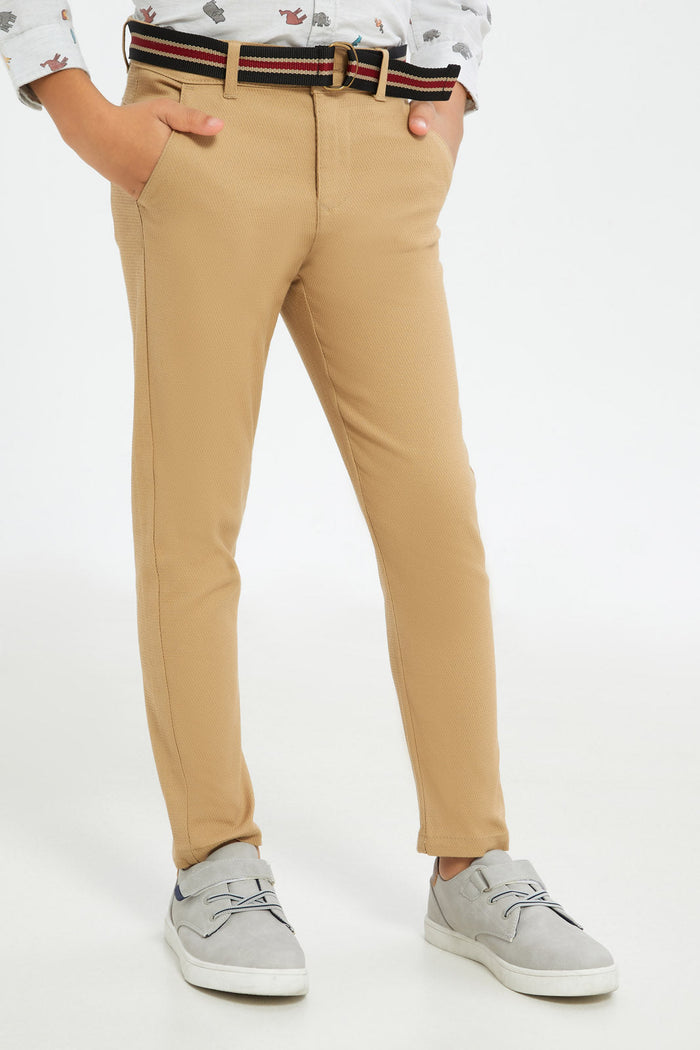 Redtag-Boys-Beige-Belted-Dobby-Trouser-BOY-Trousers,-Category:Trousers,-Colour:Beige,-Deals:New-In,-Dept:Boys,-Filter:Boys-(2-to-8-Yrs),-H1:KWR,-H2:BOY,-H3:TRS,-H4:CTR,-New-In-BOY-APL,-Non-Sale,-RMD,-S23C,-Season:S23C,-Section:Boys-(0-to-14Yrs)-Boys-2 to 8 Years