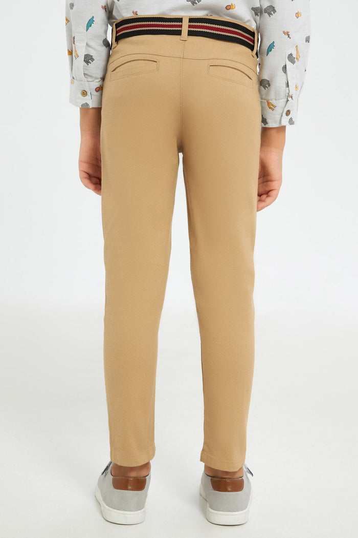 Redtag-Boys-Beige-Belted-Dobby-Trouser-BOY-Trousers,-Category:Trousers,-Colour:Beige,-Deals:New-In,-Dept:Boys,-Filter:Boys-(2-to-8-Yrs),-H1:KWR,-H2:BOY,-H3:TRS,-H4:CTR,-New-In-BOY-APL,-Non-Sale,-RMD,-S23C,-Season:S23C,-Section:Boys-(0-to-14Yrs)-Boys-2 to 8 Years