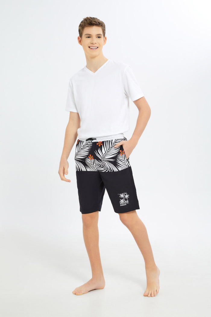 Redtag-Boys-Black/White-Palm-Tree-Board-Shorts-BSR-Swimwear,-Category:Swimwear,-Colour:Black,-Deals:New-In,-Dept:Boys,-Filter:Senior-Boys-(8-to-14-Yrs),-H1:KWR,-H2:BSR,-H3:SWM,-H4:SRT,-New-In-BSR-APL,-Non-Sale,-S23C,-Season:S23C,-Section:Boys-(0-to-14Yrs)-Senior-Boys-9 to 14 Years