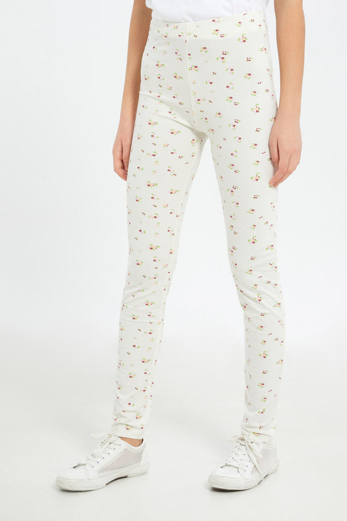 Redtag-Girls-Cream/Black-Floral-Leggings-Category:Leggings,-Colour:Black,-Deals:New-In,-Dept:Girls,-Filter:Senior-Girls-(8-to-14-Yrs),-GSR-Leggings,-H1:KWR,-H2:GSR,-H3:TRS,-H4:LEG,-New-In-GSR-APL,-Non-Sale,-S23C,-Season:S23D,-Section:Girls-(0-to-14Yrs),-TBL-Senior-Girls-9 to 14 Years