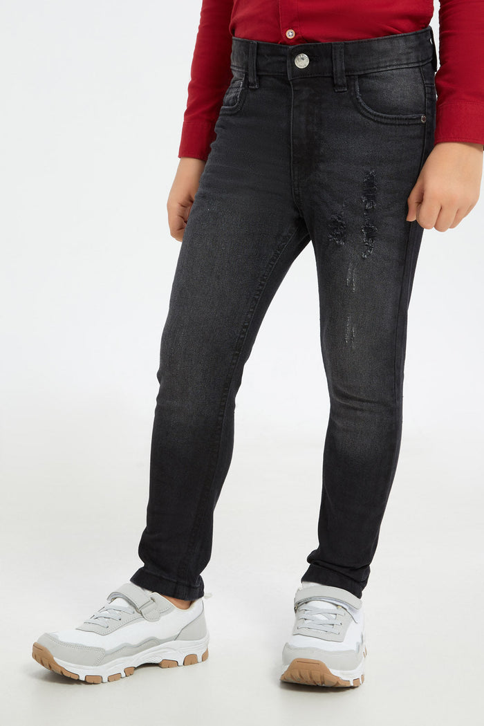 Redtag-Boys-Black-Skinny-Fit-Ripped-Jeans-BOY-Jeans,-Category:Jeans,-Colour:Black,-Deals:New-In,-Dept:Boys,-Filter:Boys-(2-to-8-Yrs),-H1:KWR,-H2:BOY,-H3:DNB,-H4:JNS,-New-In-BOY-APL,-Non-Sale,-S23B,-Season:S23B,-Section:Boys-(0-to-14Yrs)-Boys-2 to 8 Years