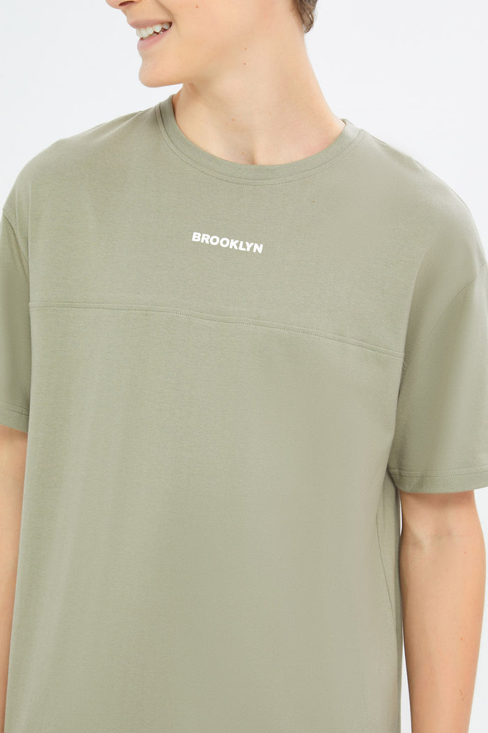 Redtag-Boys-Olive-Oversize-Cut-&-Sew-Tee-BSR-T-Shirts,-Category:T-Shirts,-Colour:Green,-Deals:New-In,-Dept:Boys,-Filter:Senior-Boys-(8-to-14-Yrs),-H1:KWR,-H2:BSR,-H3:TSH,-H4:TSH,-New-In-BSR-APL,-Non-Sale,-S23C,-Season:S23C,-Section:Boys-(0-to-14Yrs)-Senior-Boys-9 to 14 Years