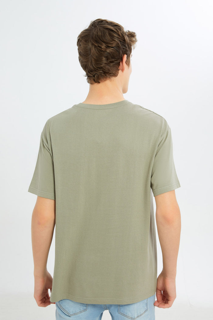 Redtag-Boys-Olive-Oversize-Cut-&-Sew-Tee-BSR-T-Shirts,-Category:T-Shirts,-Colour:Green,-Deals:New-In,-Dept:Boys,-Filter:Senior-Boys-(8-to-14-Yrs),-H1:KWR,-H2:BSR,-H3:TSH,-H4:TSH,-New-In-BSR-APL,-Non-Sale,-S23C,-Season:S23C,-Section:Boys-(0-to-14Yrs)-Senior-Boys-9 to 14 Years