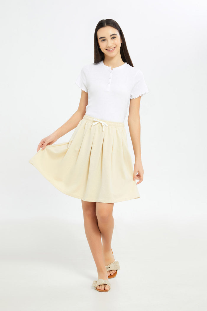 Redtag-Girls-Beige-Pleated-Skirts-Category:Skirts,-Colour:Beige,-Deals:New-In,-Filter:Senior-Girls-(8-to-14-Yrs),-GSR-Skirts,-H1:KWR,-H2:GSR,-H3:SKT,-H4:CAK,-New-In-GSR-APL,-Non-Sale,-S23C,-Season:S23C,-Section:Girls-(0-to-14Yrs)-Senior-Girls-9 to 14 Years