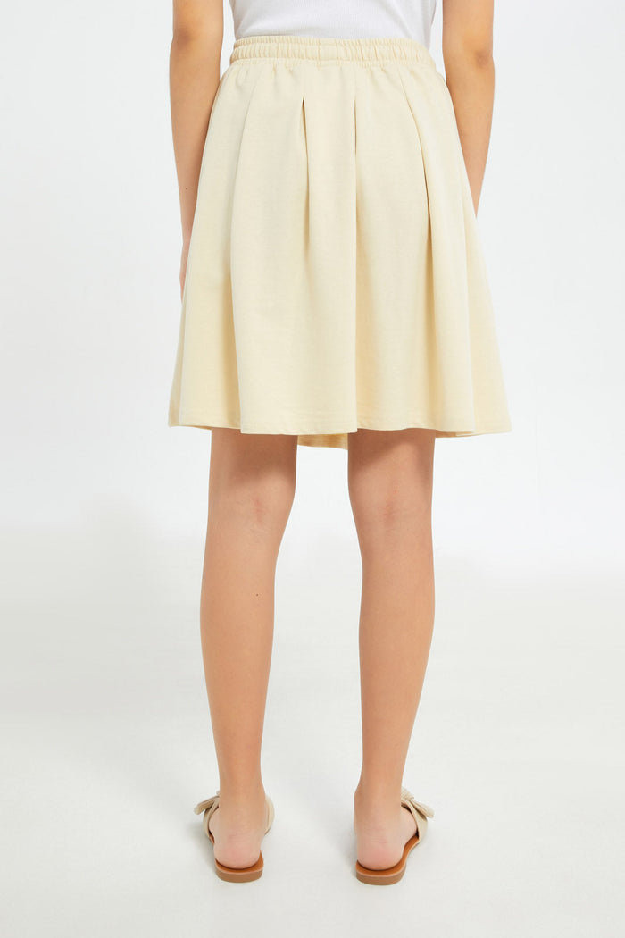 Redtag-Girls-Beige-Pleated-Skirts-Category:Skirts,-Colour:Beige,-Deals:New-In,-Filter:Senior-Girls-(8-to-14-Yrs),-GSR-Skirts,-H1:KWR,-H2:GSR,-H3:SKT,-H4:CAK,-New-In-GSR-APL,-Non-Sale,-S23C,-Season:S23C,-Section:Girls-(0-to-14Yrs)-Senior-Girls-9 to 14 Years