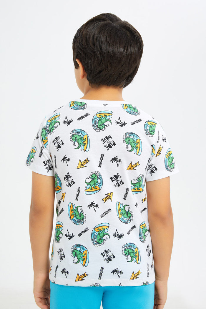 Redtag-Boys-White-Dino-Printed-Short-Sleeve-T-Shirt-BOY-T-Shirts,-Category:T-Shirts,-Colour:White,-Deals:New-In,-Filter:Boys-(2-to-8-Yrs),-H1:KWR,-H2:BOY,-H3:TSH,-H4:TSH,-New-In-BOY-APL,-Non-Sale,-Promo:TBL,-S23C,-Season:S23C,-Section:Boys-(0-to-14Yrs),-TBL-Boys-2 to 8 Years