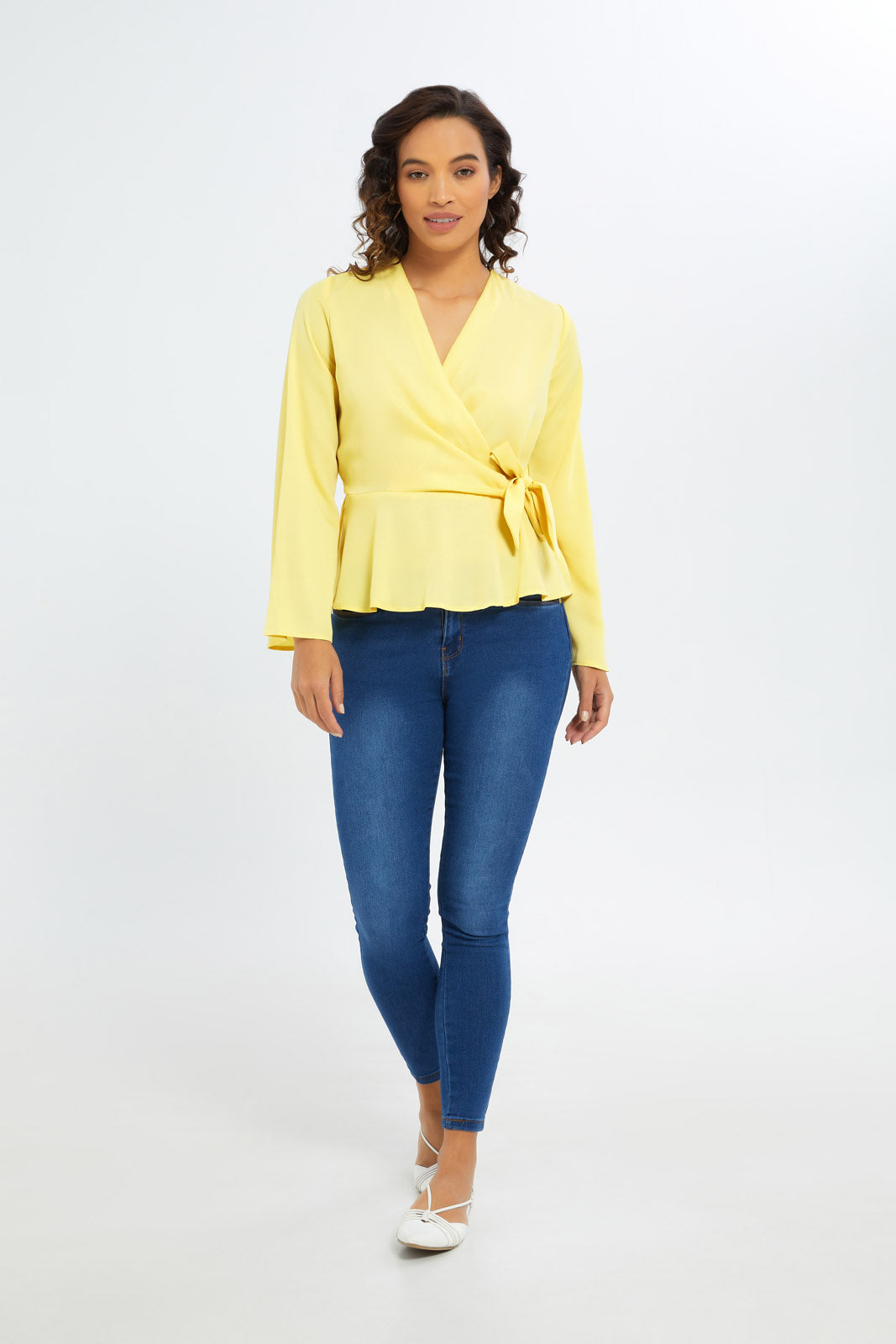 Buy Women Yellow Peplum Wrap Blouse 125411399 in UAE REDTAG UAE